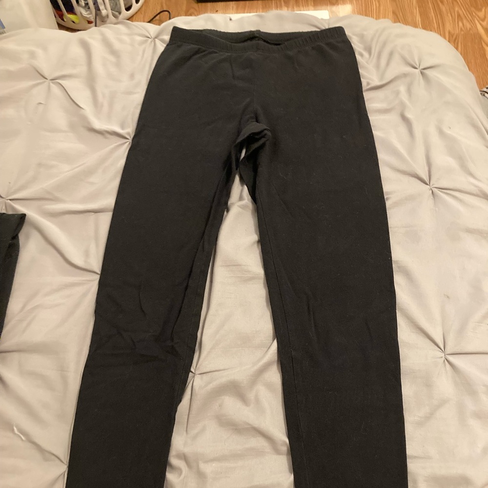 two old navy size small leggings and walmart size small leggings.